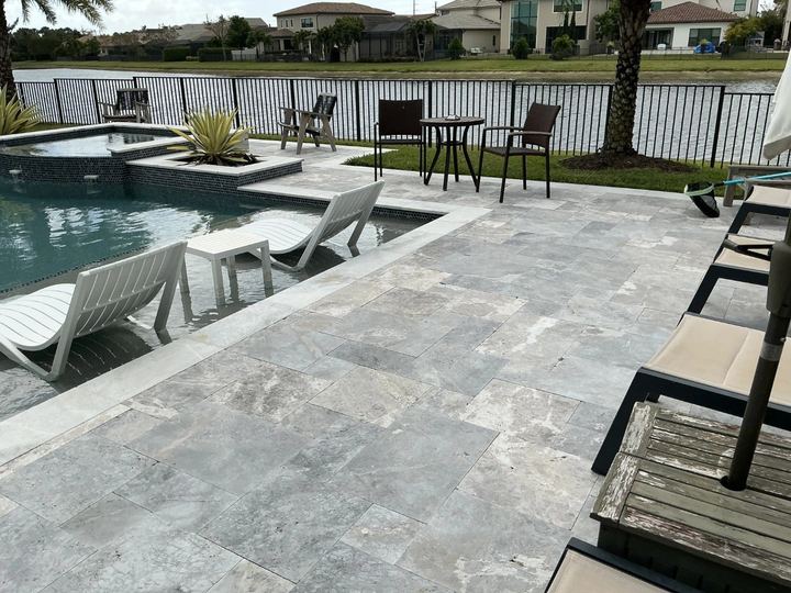 Restored concrete paver pool deck in Miramar